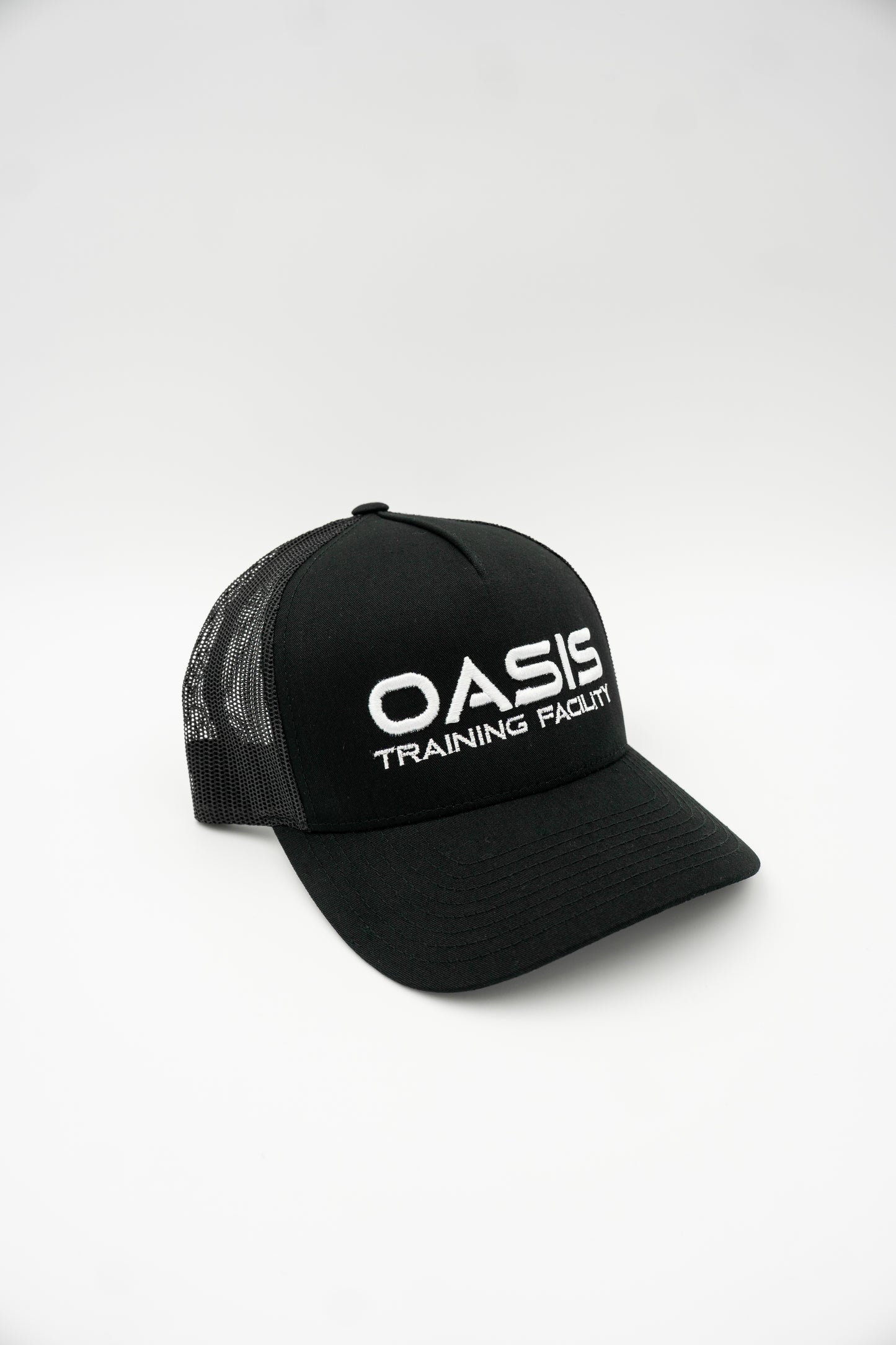 Oasis Training Facility Trucker Hat